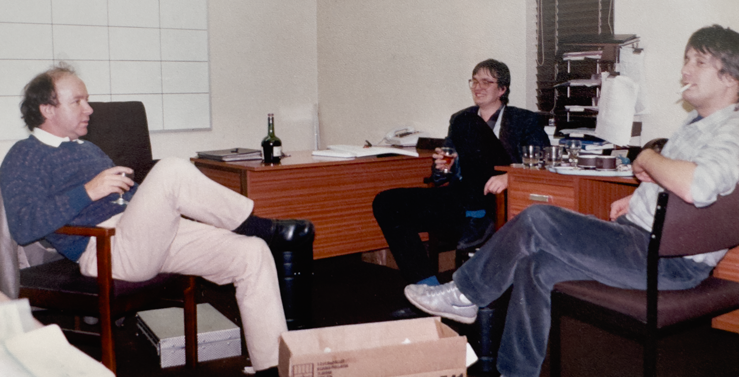 Roger and team having a 'quick drink' in the office 