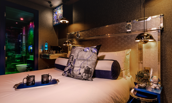 Shot of bedroom that uses flight case materials as decoration and structural elements